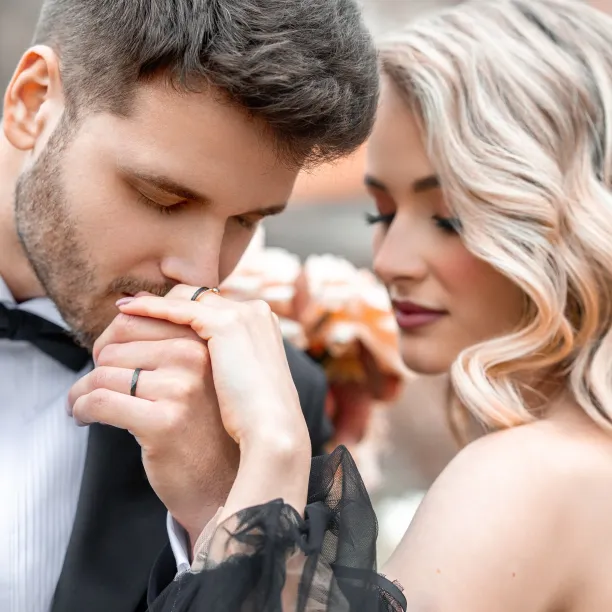 Black wedding bands in gold with hammered surface AZTEK Image