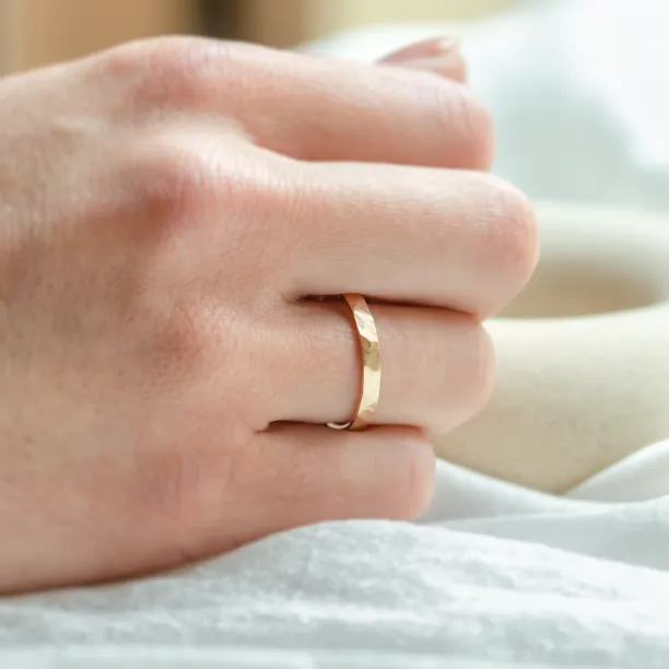 Gold hammered wedding rings BOMM Image