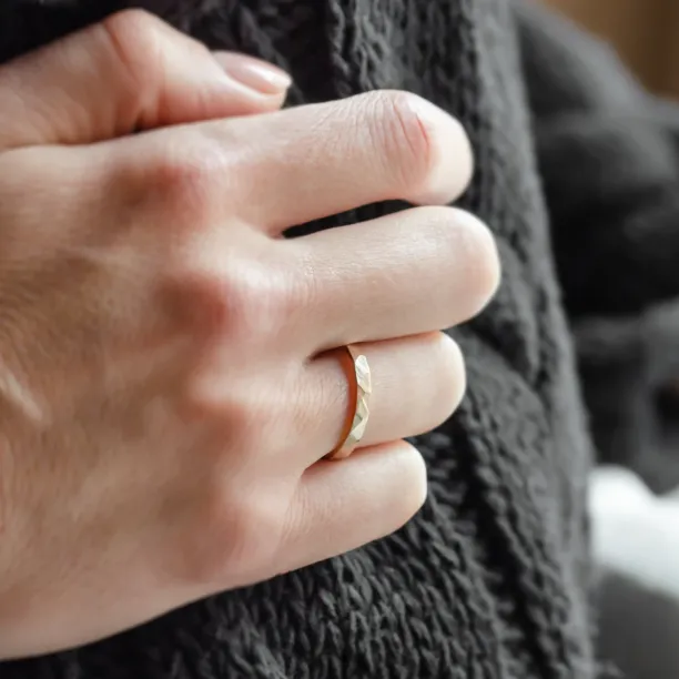 Gold hammered wedding rings BOMM Image