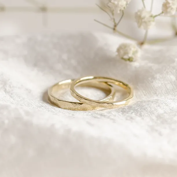 Gold hammered wedding rings BOMM Image