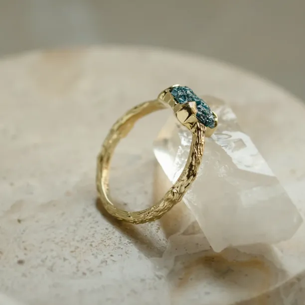 Gold ring with blue raw diamond and unusual rim SKY Image