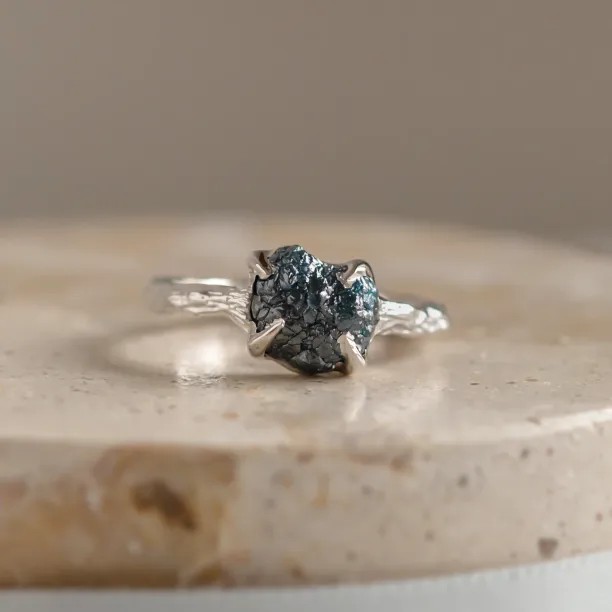 Gold ring with blue raw diamond and unusual rim SKY Image