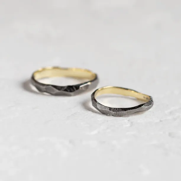 Black hammered wedding bands in organic shape GOLEM Image