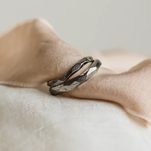 Black hammered wedding bands in organic shape GOLEM Image