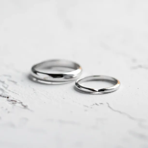 Gold wedding rings with bow tie shape LALI Image