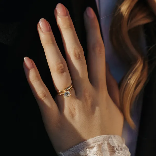 Gold wedding rings with bow tie shape LALI Image
