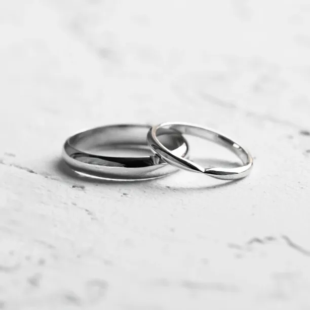 Gold wedding rings with bow tie shape LALI Image