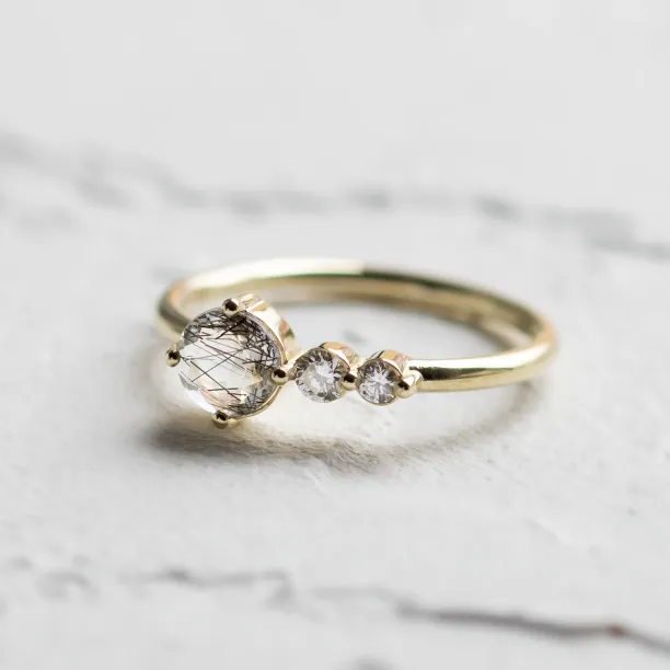 Gold ring with rutilated quartz and diamonds QUIDO Image