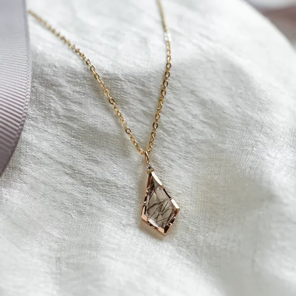 Rutilated quartz pendant with diamond MATTIAS Image
