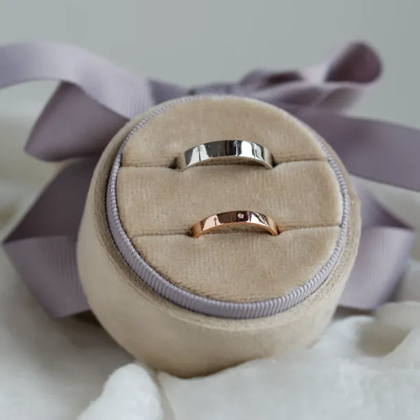 Gold wedding rings with engraved trees FORI Image