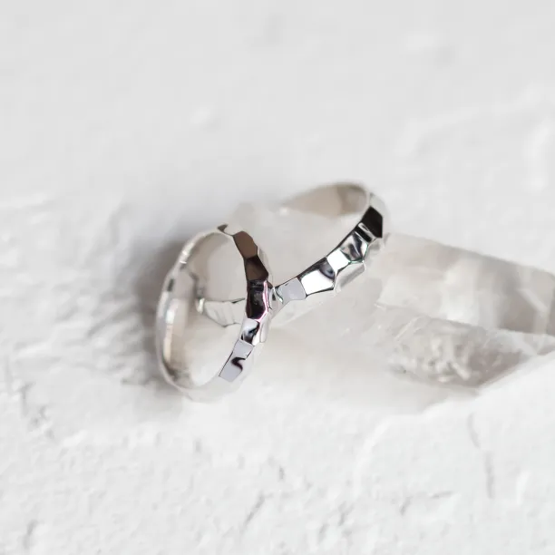 Unusual wedding rings with a shiny ESTELA Image