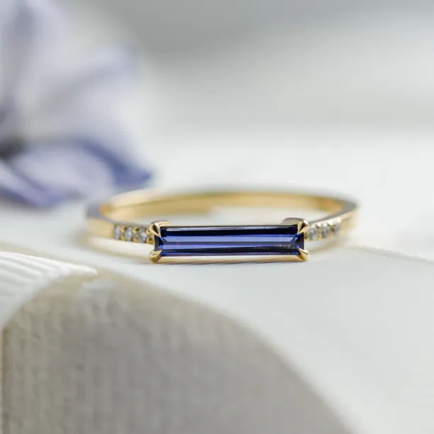 Gold ring with blue lab grown sapphire and diamonds IRIS Image