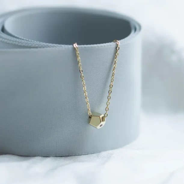 Gold bracelet with a special cube and diamond Gimle Image