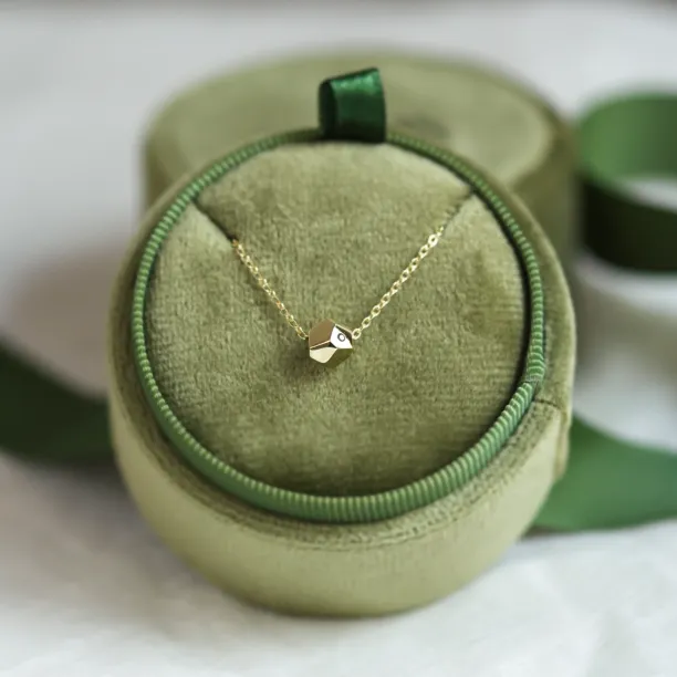 Gold bracelet with a special cube and diamond Gimle Image