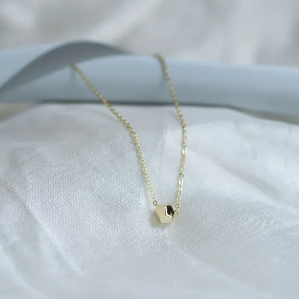 Gold bracelet with a special cube and diamond Gimle Image