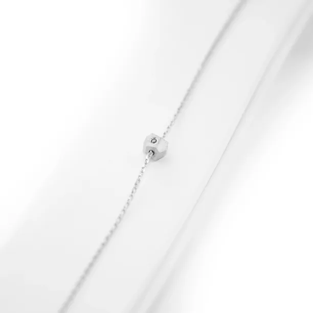 Gold bracelet with a special cube and diamond Gimle Image