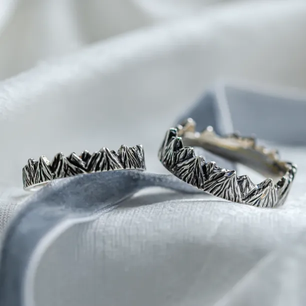 Wedding rings in mountains shape with black rhodium SILVRETTA Image