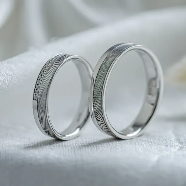 Original wedding rings with relief and diamonds PEACOCK Image