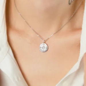 Gold necklace with atypical surface in compass design FAITH