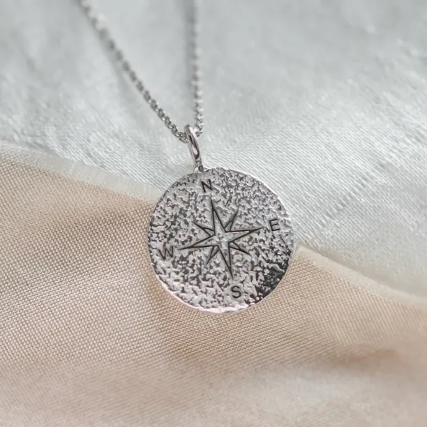 Gold necklace with atypical surface in compass design FAITH Image