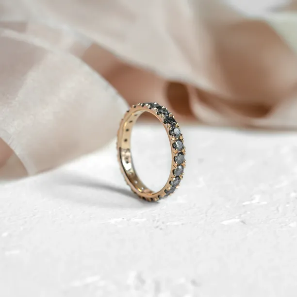 Gold eternity ring with salt and pepper diamonds LAVA Image