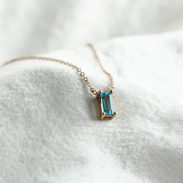 Gold necklace with a baguette cut topaz LUCERNE Image