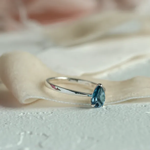 Gold ring with london blue topaz DROP Image