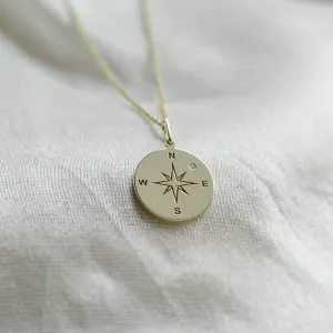 Gold pendant with a compass and a diamond MAP Thumbnail