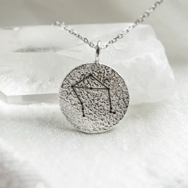 Gold necklace with zodiac sign and unusual surface NALA Image