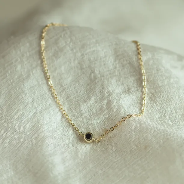 Gold bracelet with a black diamond BALA Image