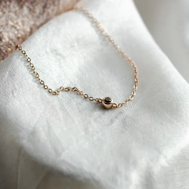 Gold bracelet with a black diamond BALA Image