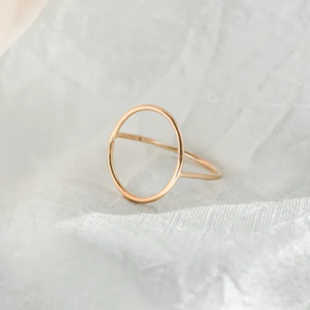 Minimalistic gold ring with the circle NORE Image