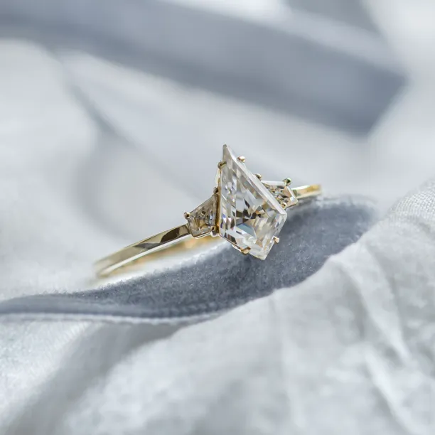 Elegant engagement ring with kite moissanites DOMPHI Image