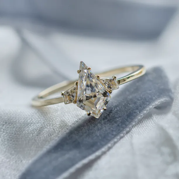 Elegant engagement ring with kite moissanites DOMPHI Image