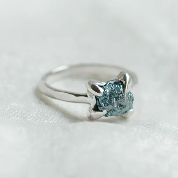 Gold ring with blue raw diamond and hammered surface SEA Image