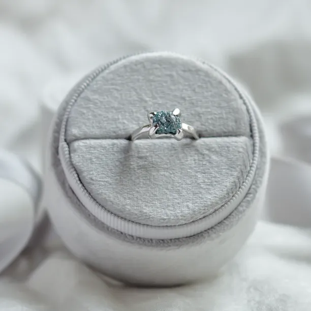 Gold ring with blue raw diamond and hammered surface SEA Image