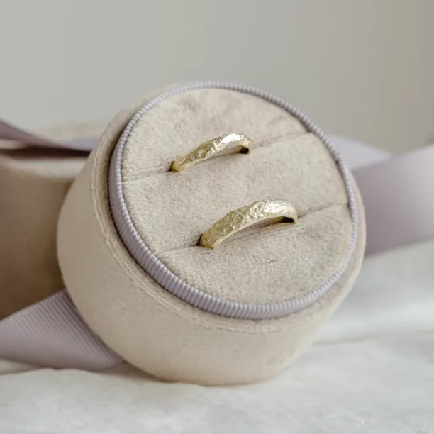 Gold wedding bands with moon surface APOLLO Image