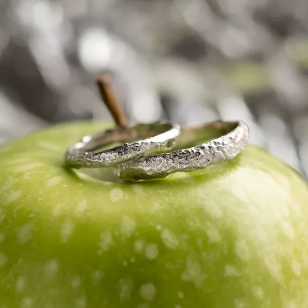 Gold wedding bands with moon surface APOLLO Image