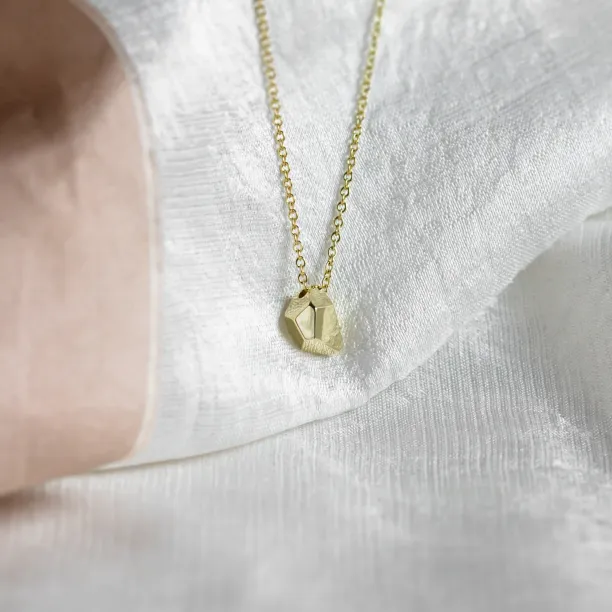 Solid gold necklace with faceted pendant RISO Image