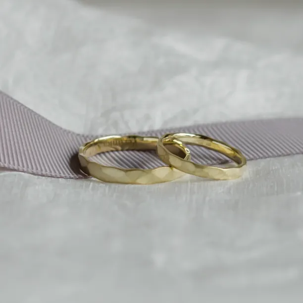 Matte gold wedding bands with hammered surface ETAIN Image
