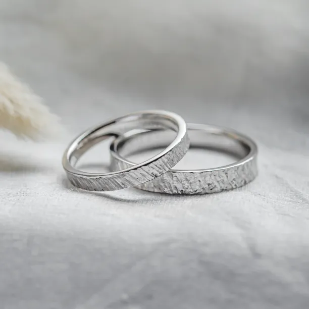 Atypical wedding rings with unusual surface TAMPERE Image