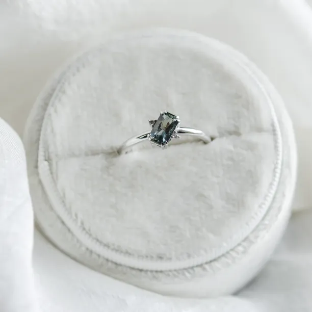 Gold ring with radiant teal sapphire and side diamonds JOY Image