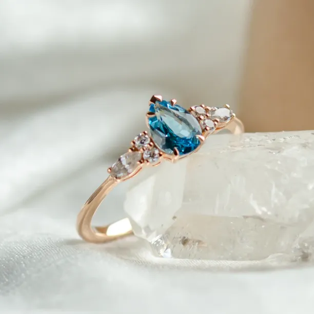 Gold ring with topaz and moissanites ASTROS Image