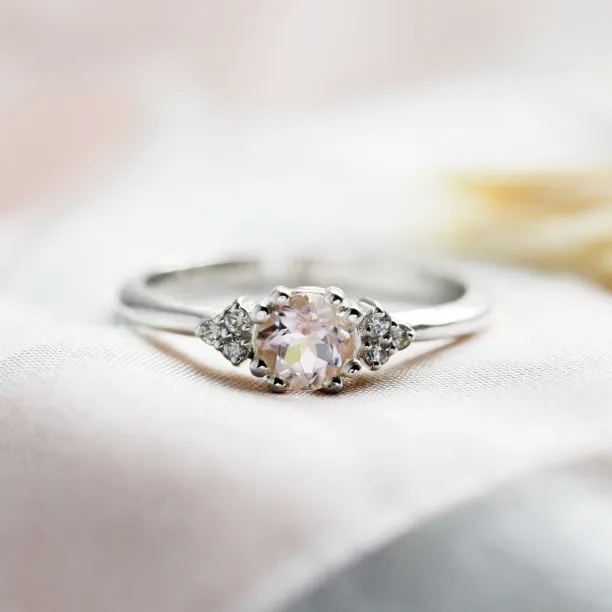 Romantic engagement ring with morganite and diamonds MONYX Image