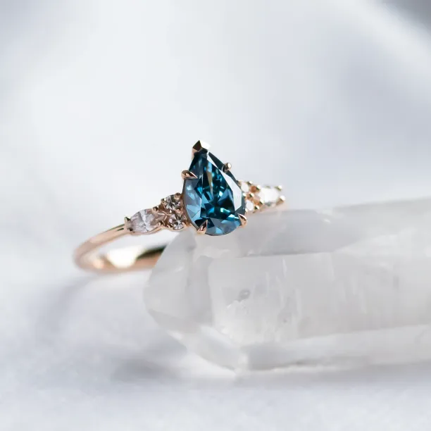 Gold ring with pear blue lab grown diamond and side diamonds AZURE Image