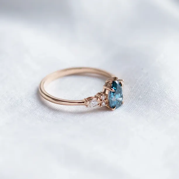 Gold ring with pear blue lab grown diamond and side diamonds AZURE Image