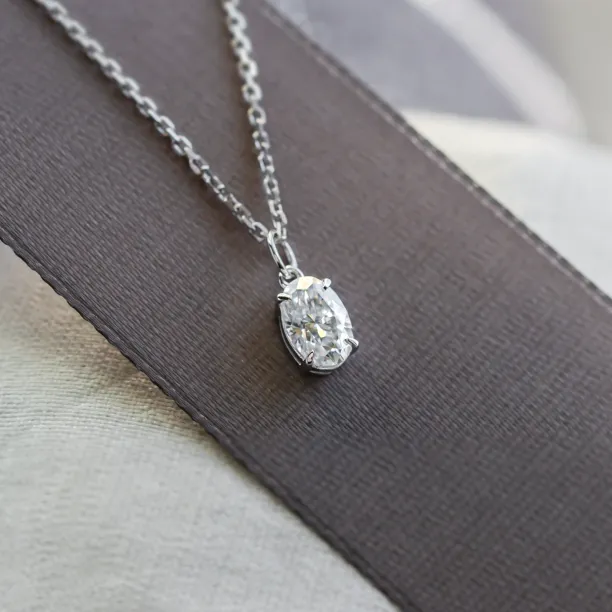 Gold pendant with oval lab created diamond VIV Image