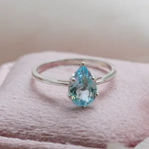 Gold ring with blue topaz OLLY