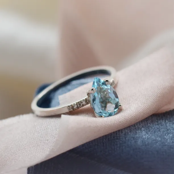 Engagement ring with blue topaz and diamonds SOFIA Image