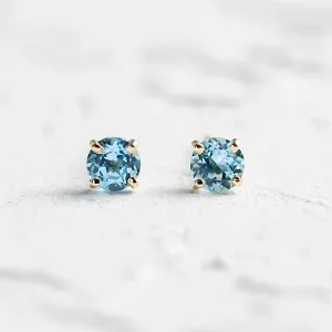 Gold earrings with blue topazes FELI